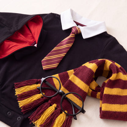 Close up of the collar, striped tie, knitted scarf and round glasses